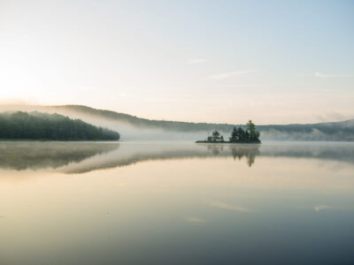 Sunrise paddling on Lake Ninevah in Mount Holly, Vermont.