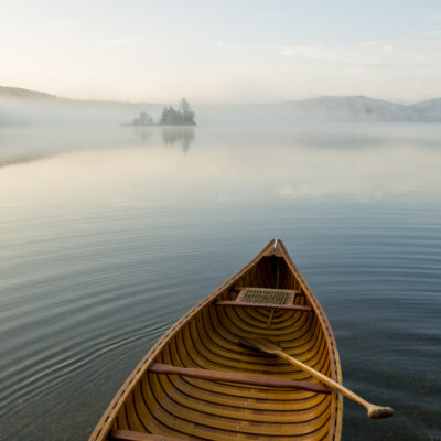 Sunrise paddling on Lake Ninevah in Mount Holly, Vermont.